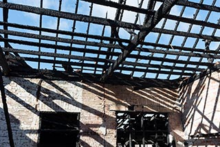 Charred roof joists of St. John's Orphanage