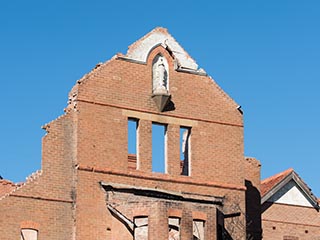 Burnt-out front wing of St. John's Orphanage