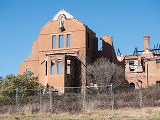 Burnt-out front wing of St. John's Orphanage