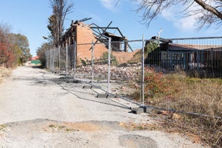 Temporary fence around St. John's Orphanage