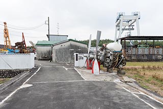 Pratt & Whitney R-2800 radial engines outside junkyard entrance