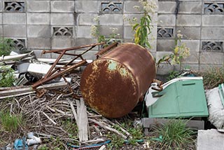 Garbage in Disused Love Hotel Car Park