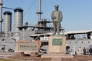 Statue of Admiral Togo in front of Battleship Mikasa