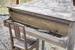 Piano in Burnt Out Wedding Venue