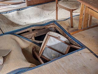 Collapsing floor in abandoned Japanese house