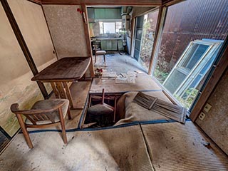 Collapsing floor in abandoned Japanese house