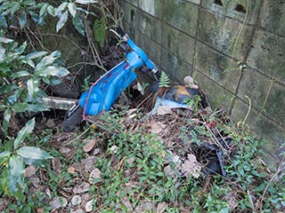 Abandoned motor scooter