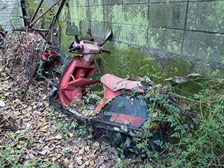 Abandoned motor scooter