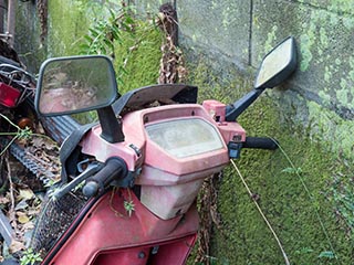 Abandoned motor scooter