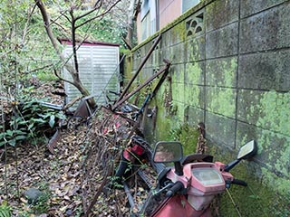 Abandoned motor scooter and motorcycle