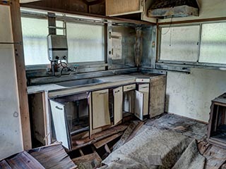 Abandoned kitchen with collapsing floor