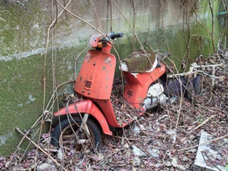 Abandoned motor scooter
