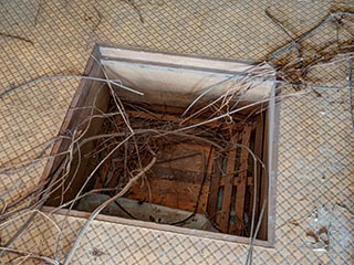 Storage compartment in kitchen floor