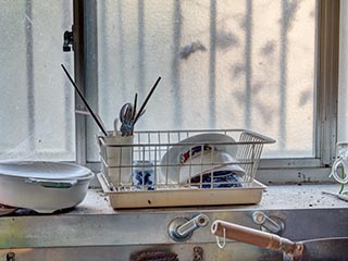 Draining rack in abandoned kitchen