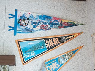 Penants on wall in abandoned Japanese house