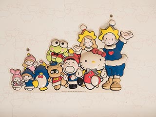 Characters on abandoned bedroom wall