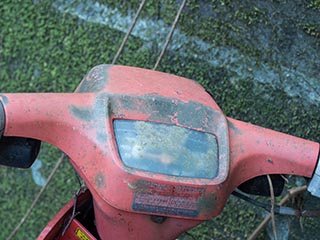 Abandoned motor scooter