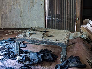 Low table in abandoned Japanese house