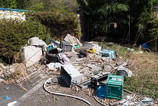 Garbage in Abandoned Love Hotel Car Park