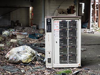 Old refrigerator in Hotel Bluebird carpark