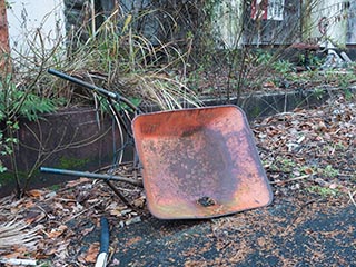 Old wheelbarrow outside Hotel Gaia