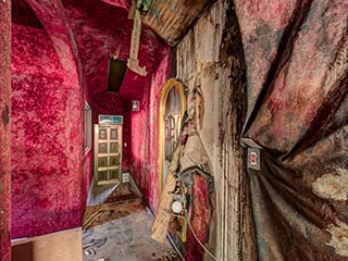 Decaying hallway in Hotel Gaia