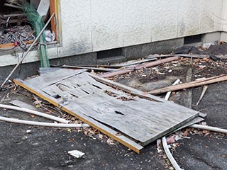 Broken door outside Hotel Gaia