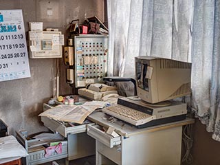 Desk and computer in office of Hotel New Royal