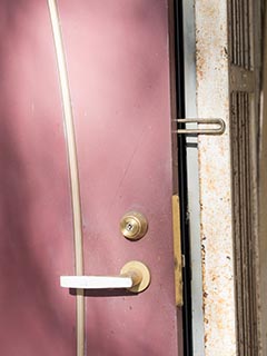 Door to guest room at Hotel New Royal