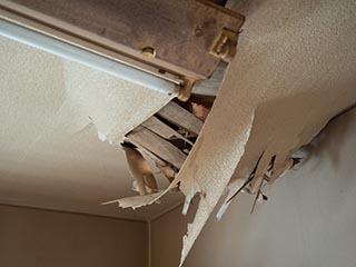 Collapsing ceiling in manager's house of Hotel Penguin Village