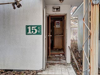 Entrance to room 15 of Hotel Queen