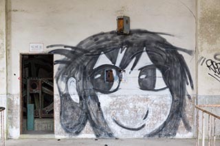 Graffiti on Mitosanguchi Station wall