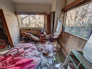 Filthy guest room at abandoned love hotel Century