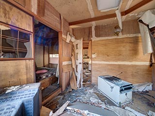 Filthy, decaying guest room at abandoned love hotel Century