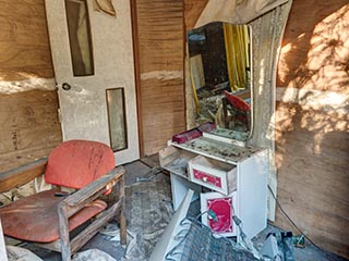 Filthy, decaying guest room at abandoned love hotel Century