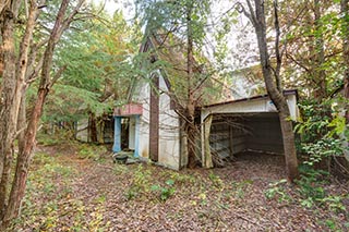 Abandoned Love Hotel Don Quixote Cottage and Carport