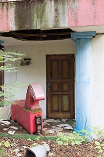 Abandoned Love Hotel Don Quixote Coin Operated Horse outside Cottage