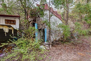 Abandoned Love Hotel Don Quixote Leaning Cottage