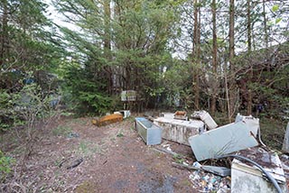 Abandoned Love Hotel Don Quixote Garbage in Forecourt