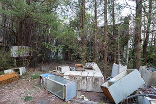 Abandoned Love Hotel Don Quixote Garbage in Forecourt