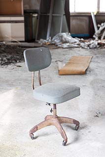 Old Chair in Attic of Abandoned Book and Video Store