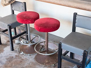 Stools in abandoned Japanese Restaurant