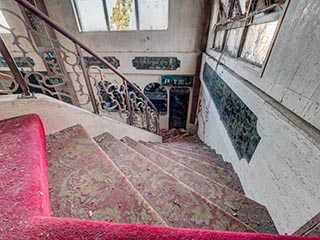 Lobby staircase in Queen Château Soapland