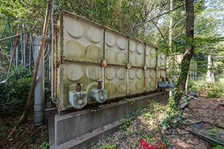 Water tanks behind Queen Château Soapland