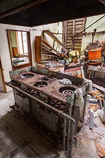 Gas Stove in Abandoned Restaurant Kitchen