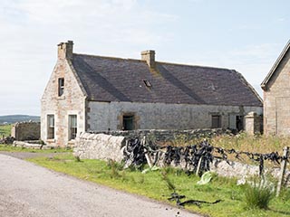 abandoned stone storehouse