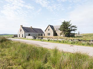 abandoned stone house and storehouse in Scotland