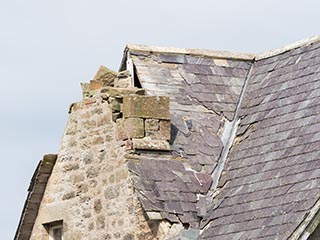 damaged chimney of abandoned house