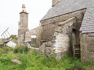 partially collapsed extension on house