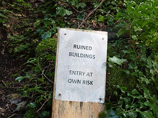 warning sign outside Fraoch Eilean Castle